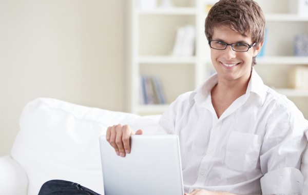 A young man with laptop